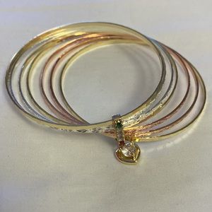 Weekly , Size 7 with gold bath 18 k golplaited,3 gold and gold,rose,silver
